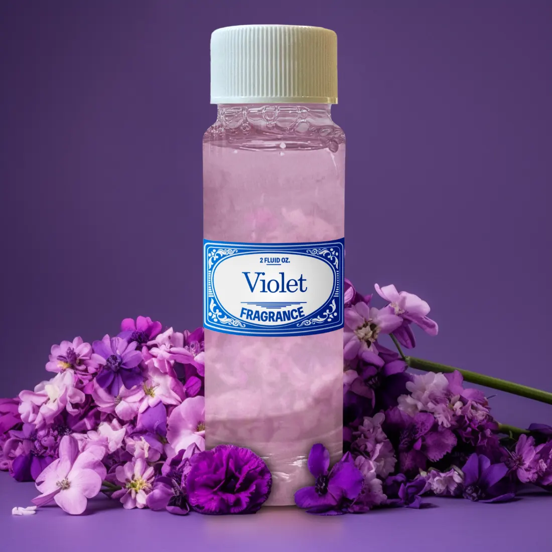 Violet essential oil in the bottle Stock Photo